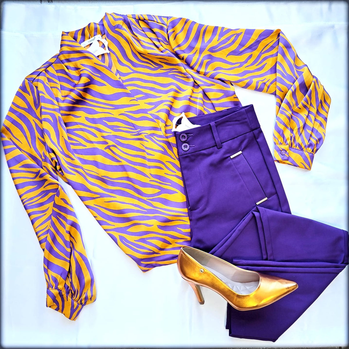BLUSA MANGA LARGA ESTAMPADO ANARANJADO VIOLETA
