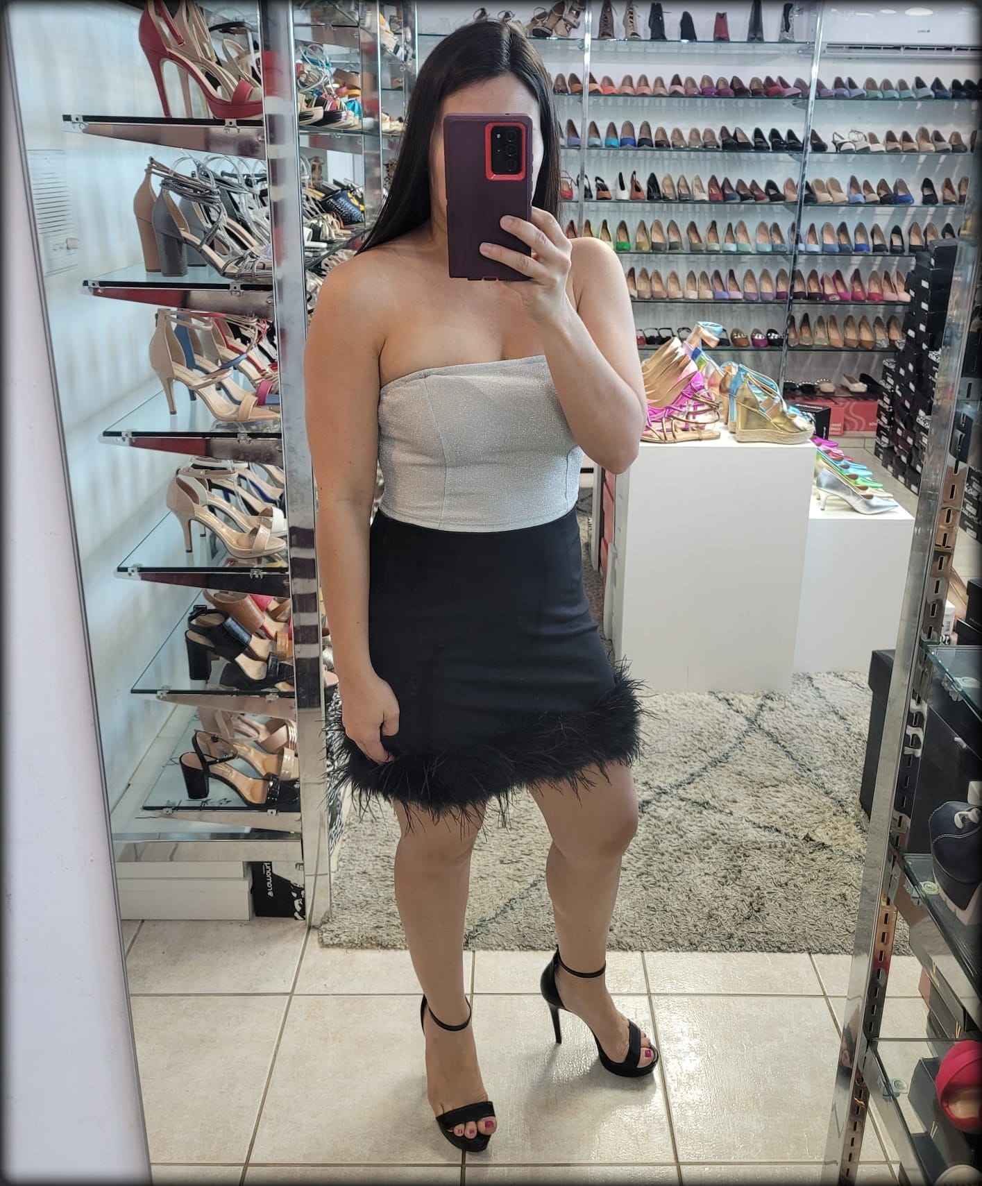 FALDA CORTA NEGRA PLUMAS
